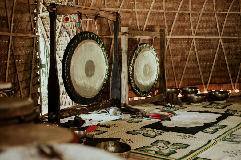 a group of gongs sitting on top of a table