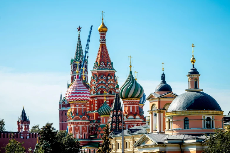 a group of buildings that are next to each other, by Julia Pishtar, pexels contest winner, baroque, vladimir putin, black domes and spires, a colorful, 🚿🗝📝