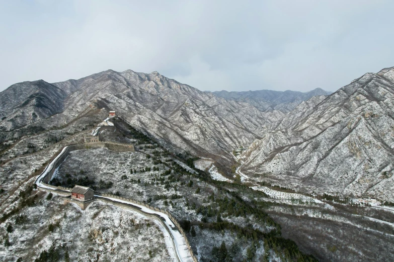 an aerial view of the great wall of china, a detailed matte painting, inspired by Zhang Kechun, realism, snowy, promo image, lpoty, highly realistic”