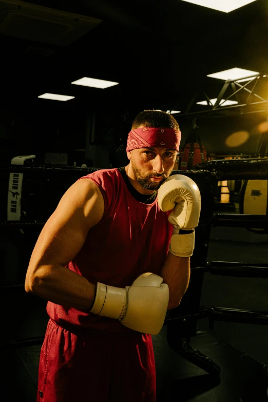 a man in a red shirt and white boxing gloves, a portrait, by Matt Cavotta, pexels contest winner, process art, combat gear, square, working out, portrait of sam hyde