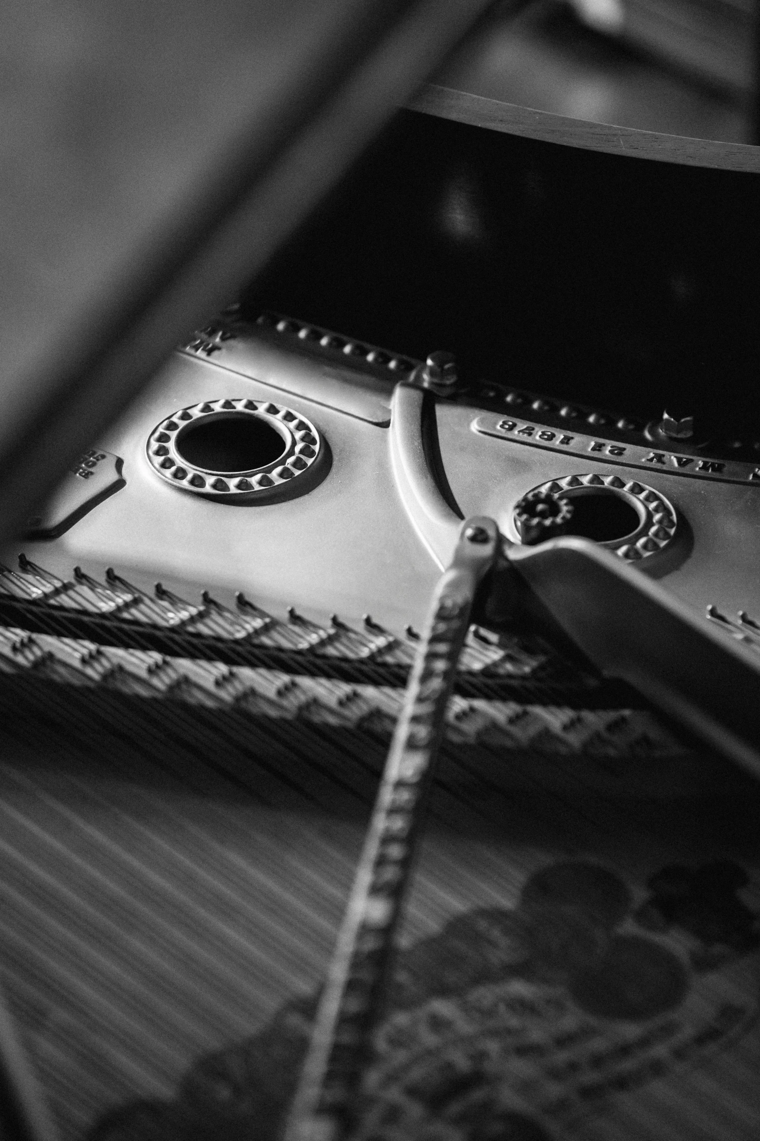 a black and white photo of a piano, precisionism, zippers, dials, uploaded, detail shots