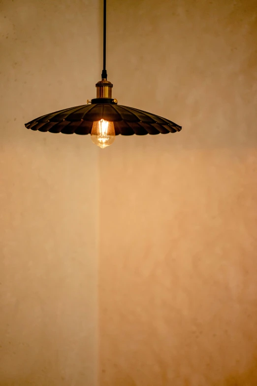 a light hanging from a ceiling in a room, a portrait, by David Simpson, unsplash, morrocan lamp, detail studio quality lighting, cafe lighting, yellow lighting from right