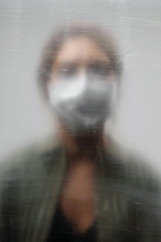 a close up of a person wearing a face mask, a picture, inspired by Anna Füssli, blurry image, white fog painting, david kassan, virus