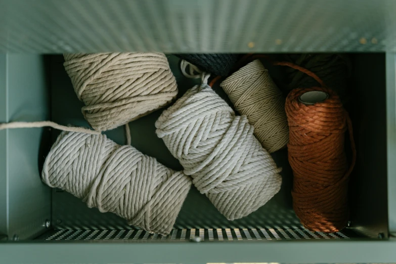 twine of twine of twine of twine of twine of twine of twine of twine of twine of twin, inspired by W. Lindsay Cable, pexels contest winner, sitting on a store shelf, limited colour palette, high angle close up shot, sustainable materials