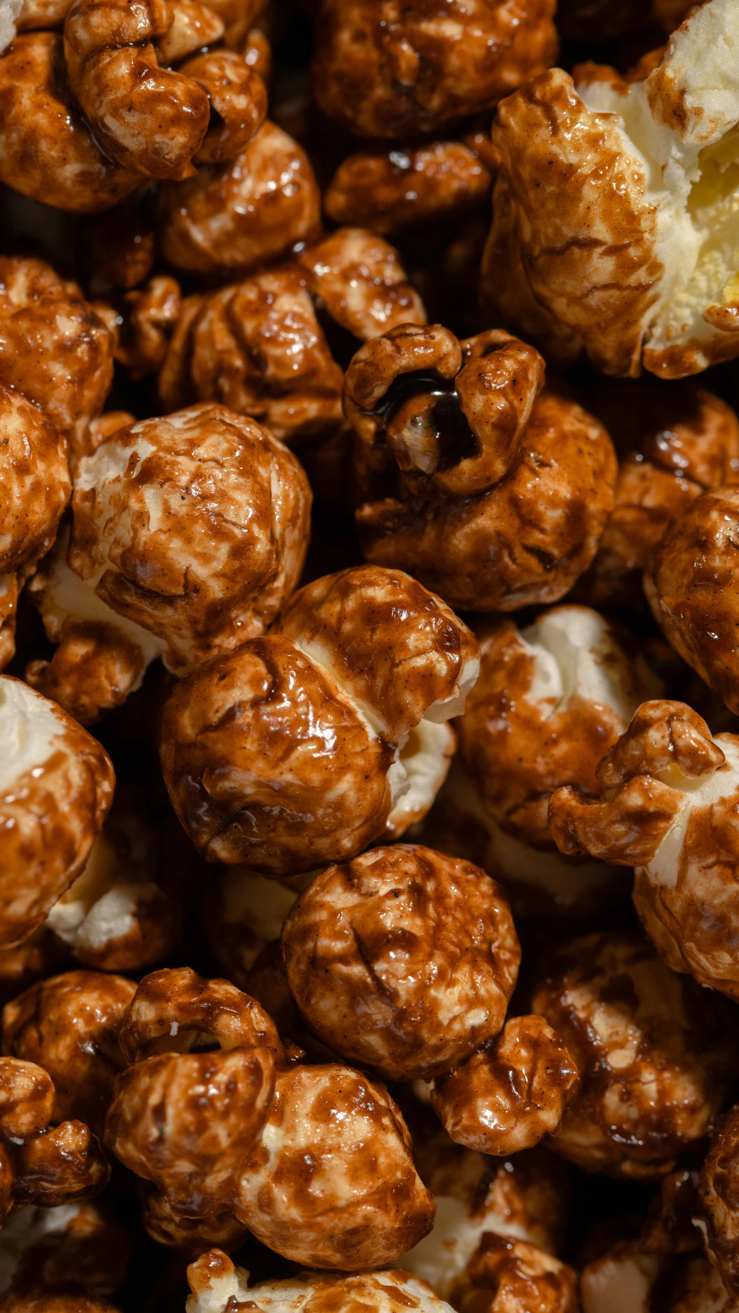 a pile of caramel popcorn with a bite taken out of it, by Lee Loughridge, slide show, marsden, square, volcanic