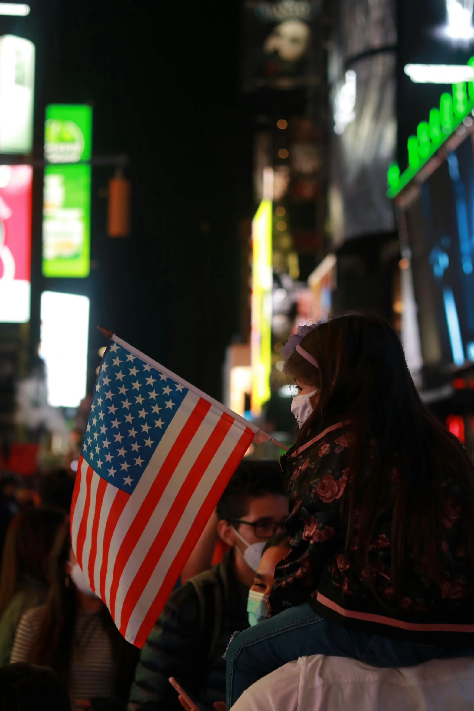 a group of people that are standing in the street, american flag, during the night, new york times, thumbnail