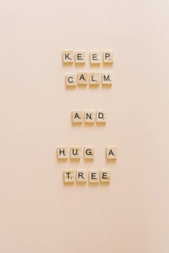 a sign that says keep calm and hug a tree, inspired by Knud Agger, unsplash, hurufiyya, a rubik's cube, beige, 15081959 21121991 01012000 4k, soft aesthetic