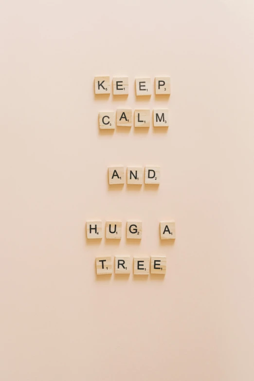 a sign that says keep calm and hug a tree, inspired by Knud Agger, unsplash, hurufiyya, a rubik's cube, beige, 15081959 21121991 01012000 4k, soft aesthetic