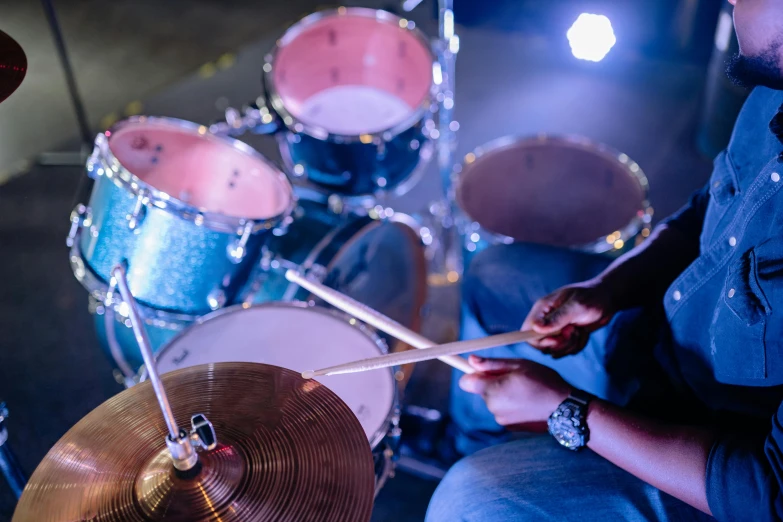 a man sitting in front of a drum set, pexels contest winner, hurufiyya, music being played, rectangle, 15081959 21121991 01012000 4k, medium detail