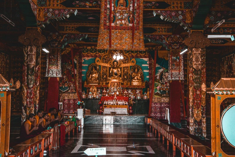 a large room with a clock inside of it, trending on unsplash, cloisonnism, an altar of a temple, 🦩🪐🐞👩🏻🦳, tibetan inspired architecture, never seen before