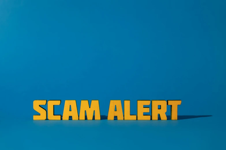 the word scam alert on a blue background, a poster, pexels contest winner, gold, clemens ascher, background image, unreleased