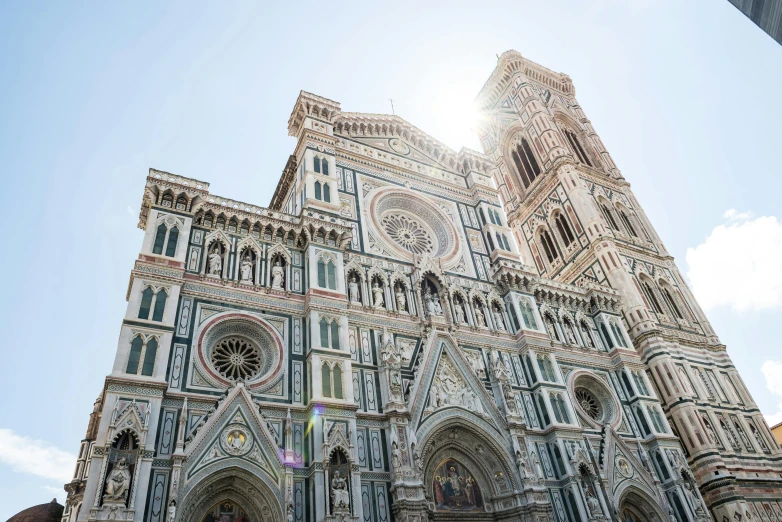 a very tall building with a clock on it's face, inspired by Giotto, pexels contest winner, renaissance, sparkling in the sunlight, alabaster gothic cathedral, 🚿🗝📝, ground - level view