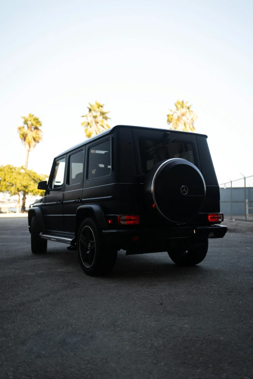 a black mercedes benz benz benz benz benz benz benz benz benz benz benz benz benz benz benz, a picture, unsplash, centered full body rear-shot, los angeles ca, profile image, album