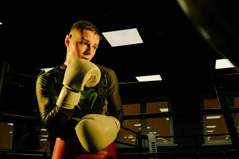 a close up of a person in a boxing ring, liam brazier, profile image, preparing to fight, 8k octan photo