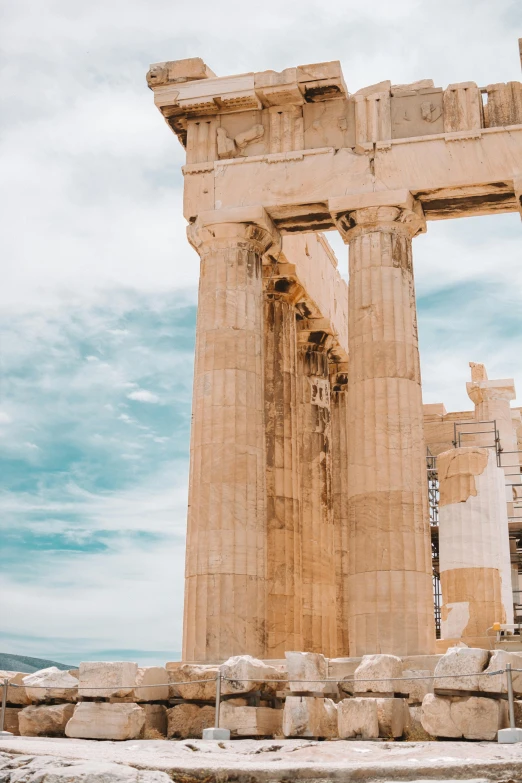 a couple of people that are standing in front of a building, pexels contest winner, neoclassicism, greek acropolis, 🚿🗝📝