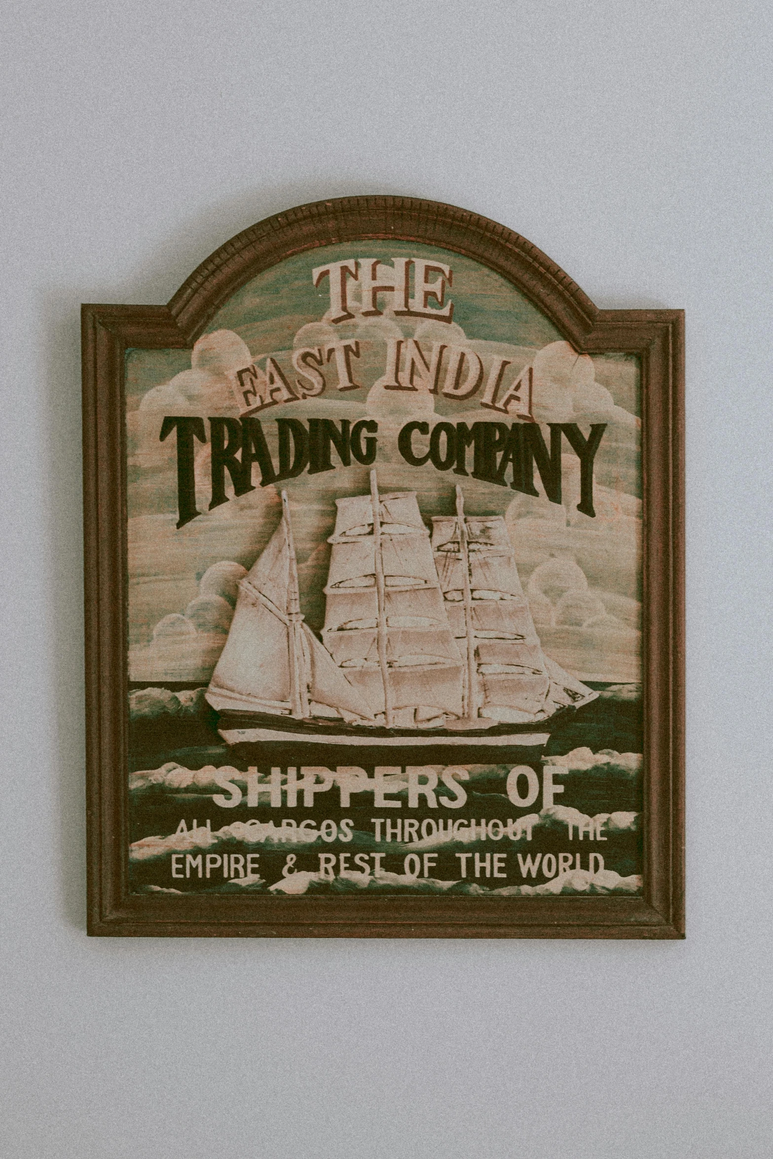 a close up of a sign on a wall, inspired by Fitz Henry Lane, folk art, trading depots, india, ship interior, made of wood