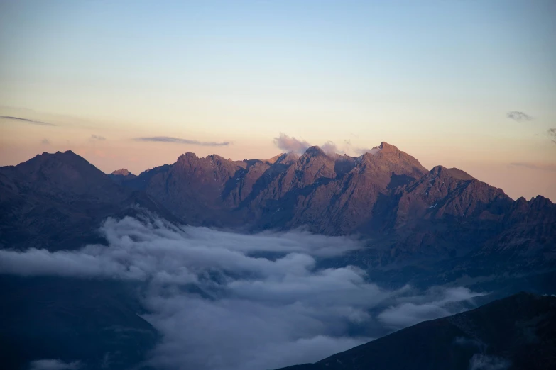 a view of the mountains from the top of a mountain, by Matthias Weischer, pexels contest winner, hurufiyya, early morning, boka, slightly pixelated, instagram photo