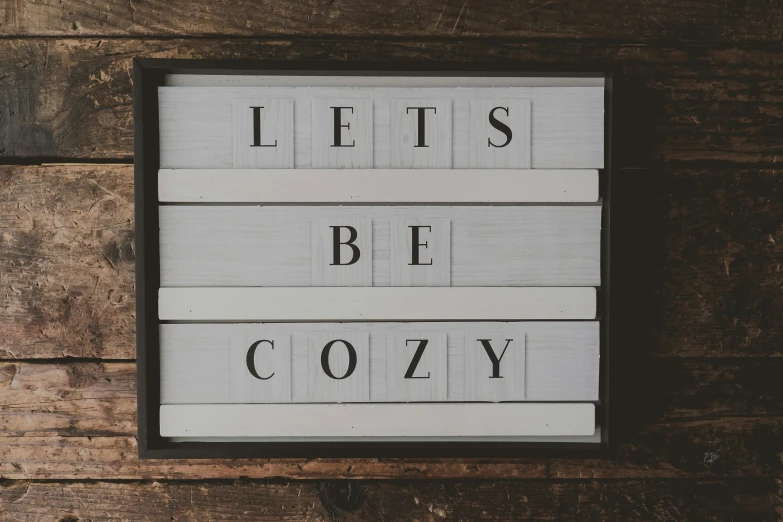 a wooden sign that says let's be cozy, pexels contest winner, made of all white ceramic tiles, 1 6 x 1 6, thumbnail, steamy