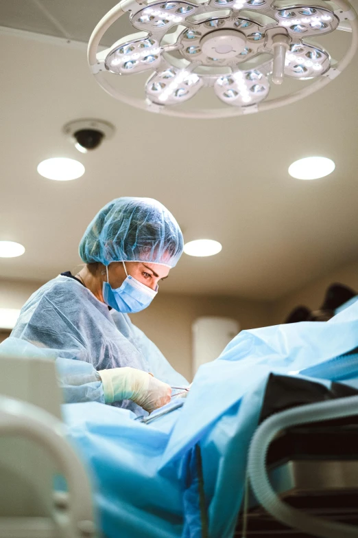 a surgeon is operating a patient in an operating room, a picture, by Meredith Dillman, shutterstock, instagram post, surgical supplies, beautifully daylight, multi - layer