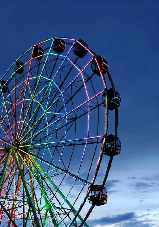 a large ferris wheel sitting in the middle of a field, profile image, colored neons, square, outdoor fairgrounds