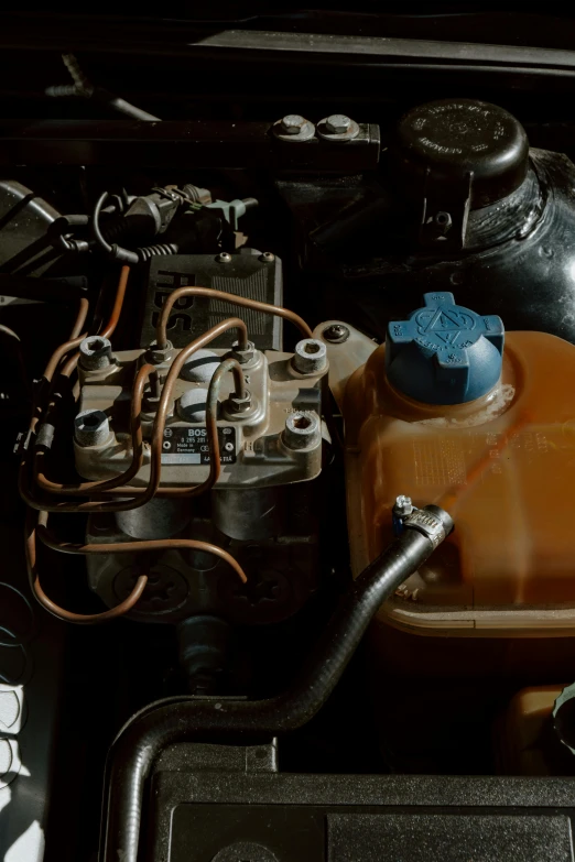 a close up of the engine of a car, by Thomas Bock, chemicals, top - down photograph, brown, ( conceptual art )