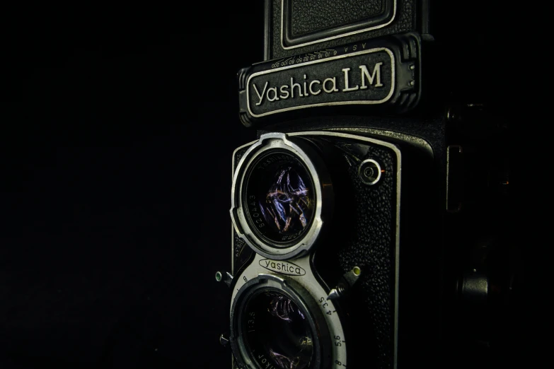 a close up of a camera with a black background, by Adam Marczyński, unsplash, photorealism, yashica me - 1, insignia, museum photo, v - ray collection