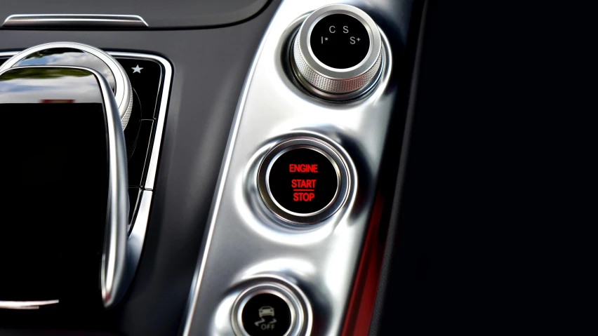 a close up of the dashboard of a car, sitting on a red button, ambient key art, 3 d render of an aston martin, got shut down