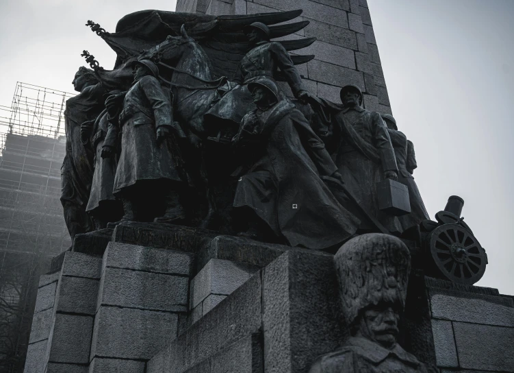 a black and white photo of a monument, by Attila Meszlenyi, pexels contest winner, socialist realism, color image, imperial military, brown, angel of verdun