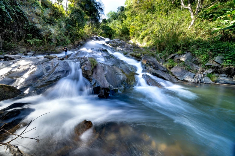 a river running through a lush green forest, by Alexander Brook, pexels contest winner, sri lanka, white water rapids, thumbnail, high quality photo