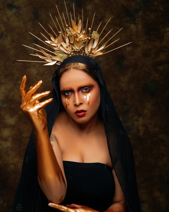 a woman with gold paint and a crown on her head, an album cover, shutterstock contest winner, nun fashion model, lgbtq, menacing!, 2019 trending photo