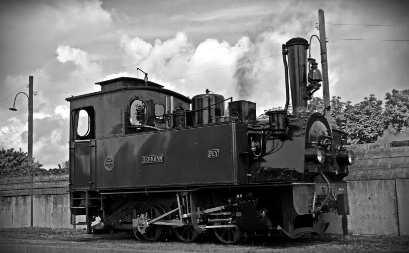 a black and white photo of a train engine, a portrait, pixabay, colombian, a steam wheeler from 1880s, number 31!!!!!, sardax