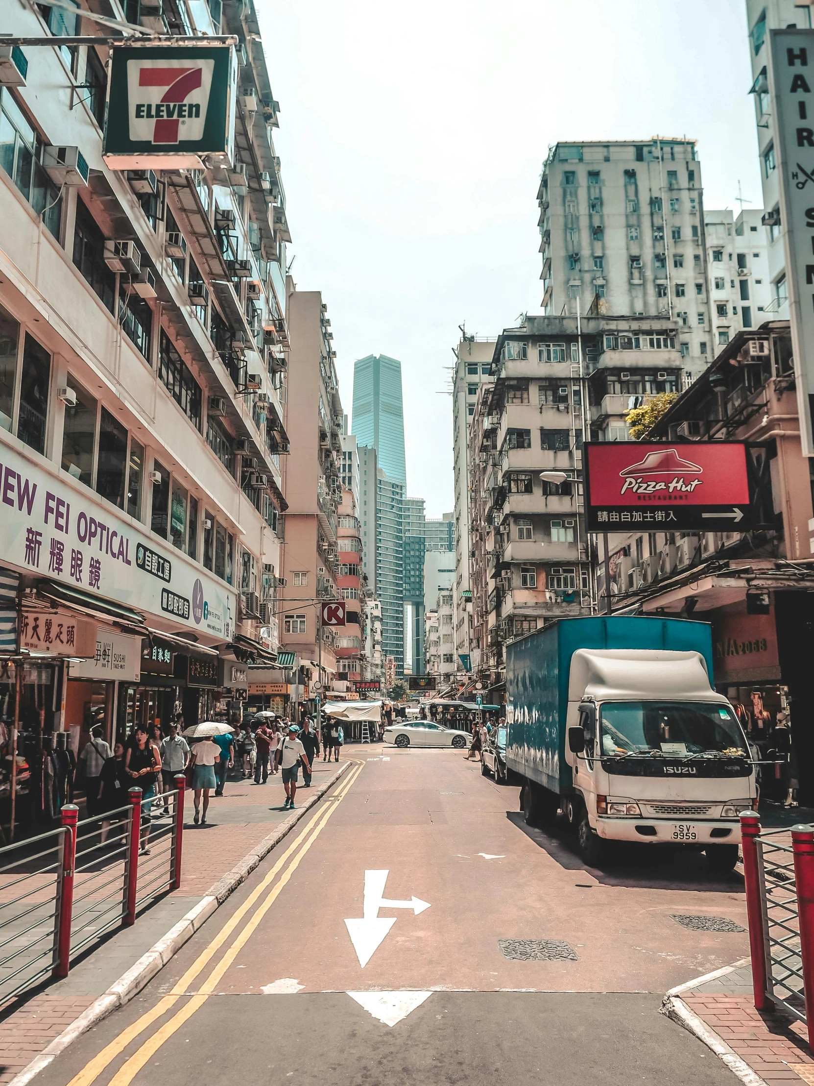 a city street filled with lots of tall buildings, an album cover, inspired by Thomas Struth, pexels contest winner, artwork of a hong kong street, 🚿🗝📝, 3d parallax view effect, road street signs