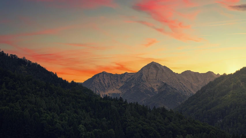 a couple of cows standing on top of a lush green hillside, unsplash contest winner, romanticism, orange and red sky, mount olympus, “ aerial view of a mountain, at dusk at golden hour