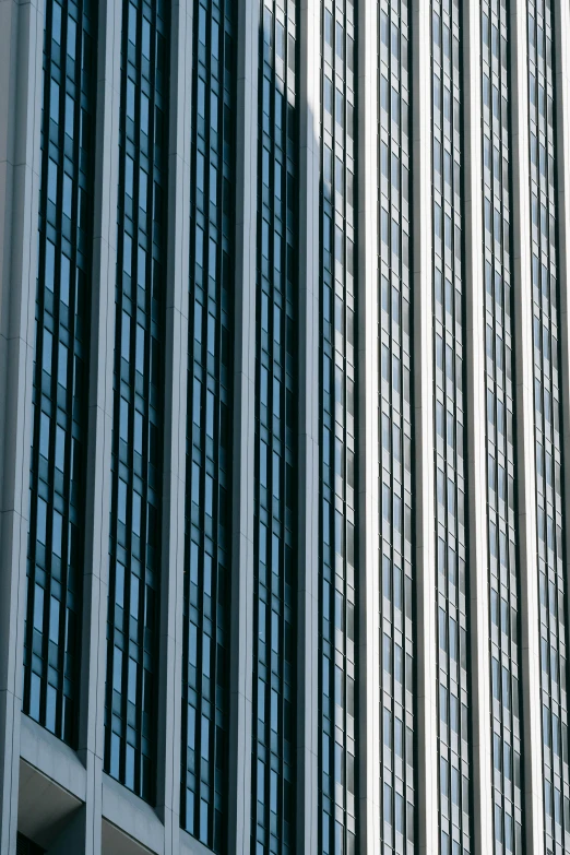 a traffic light in front of a tall building, a picture, inspired by Andreas Gursky, silver and blue colors, pittsburgh, f / 1. 9 6. 8 1 mm iso 4 0, square lines