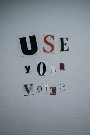 a sign that says use your voice on a wall, by Robbie Trevino, unsplash, ((portrait)), 15081959 21121991 01012000 4k, vocal tract model, paul rand