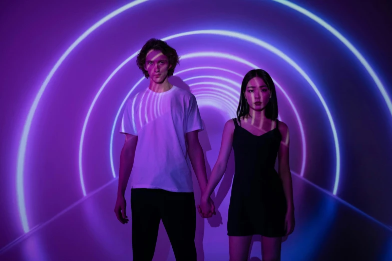 two people standing next to each other in a tunnel, an album cover, pexels contest winner, light and space, soft neon purple lighting, set on singaporean aesthetic, infinity mirror, 5 0 0 px models