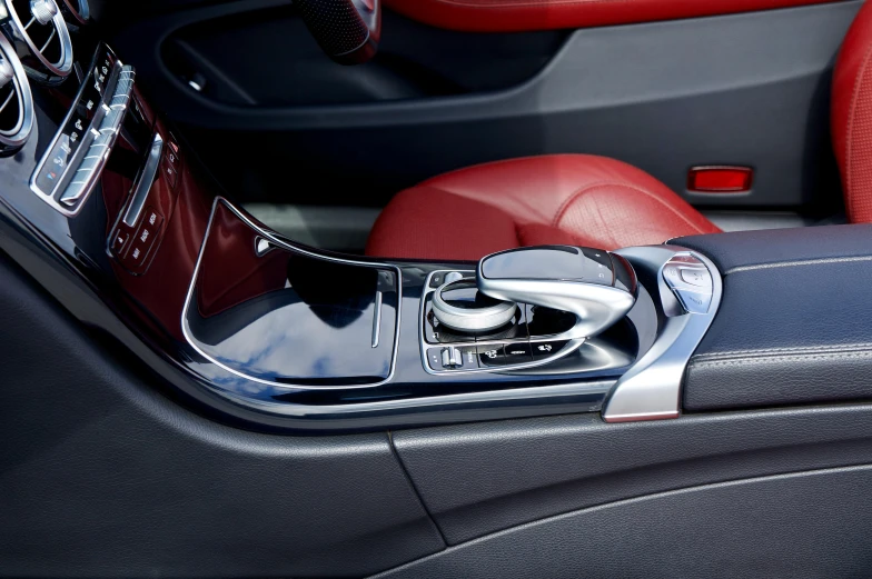 a close up of the interior of a car, les automatistes, gleaming silver and rich colors, red interior, thumbnail, levers