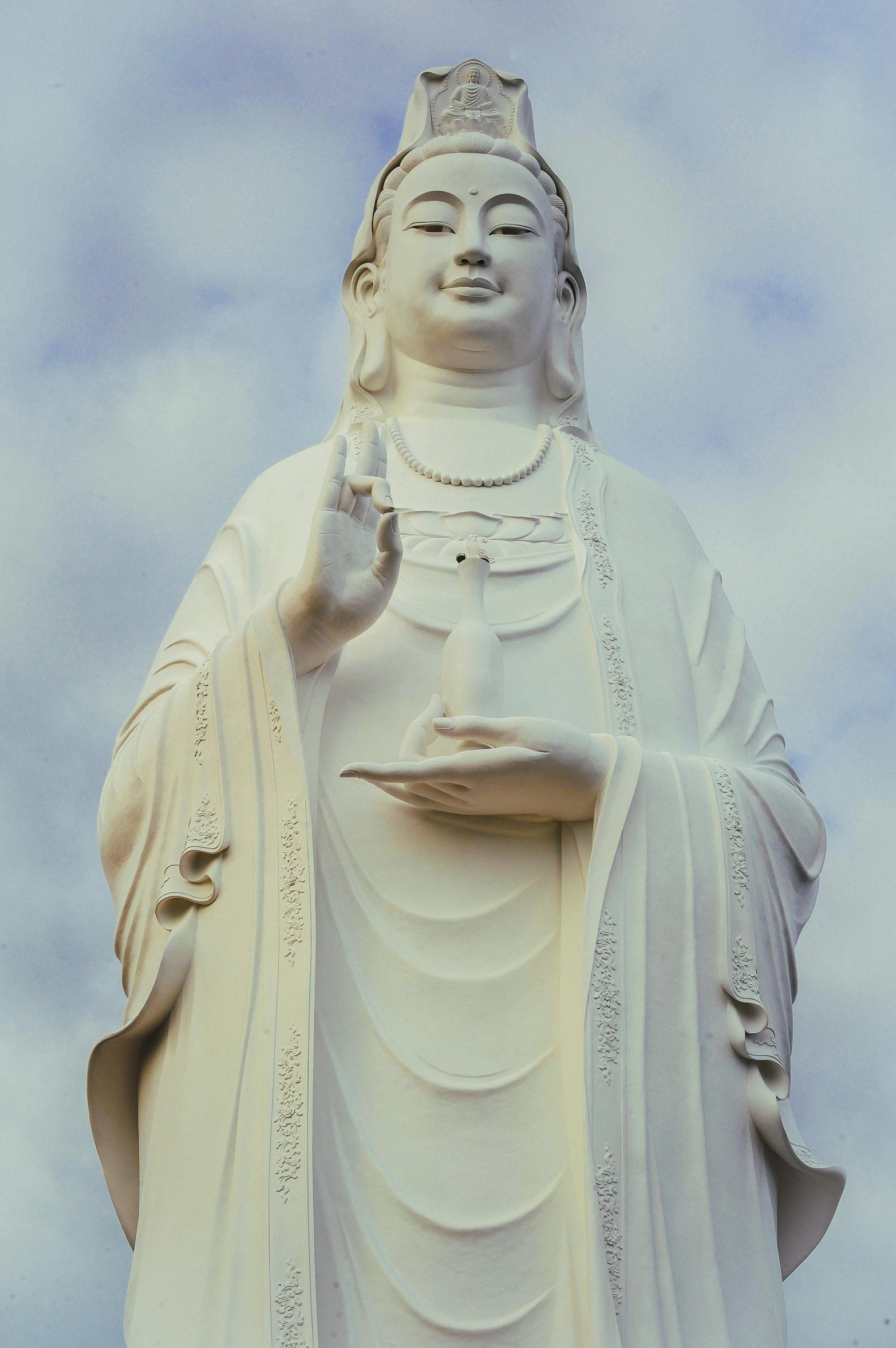 a statue of a woman holding a plate, a statue, inspired by Yang Buzhi, unsplash, frontal view, guanyin, exterior, white