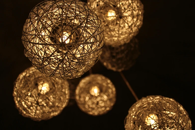 a close up of a bunch of lights, an album cover, inspired by Bruce Munro, pexels, light and space, energy spheres, woven with electricity, natural candle lighting, shaded lighting