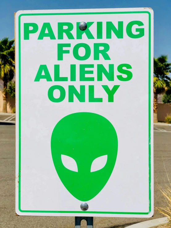 a sign that says parking for aliens only, greens), illustration », fan favorite, movie photo