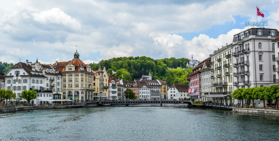 a river running through a city next to tall buildings, by Karl Stauffer-Bern, pexels contest winner, renaissance, viewed from the harbor, white buildings, thumbnail, slide show