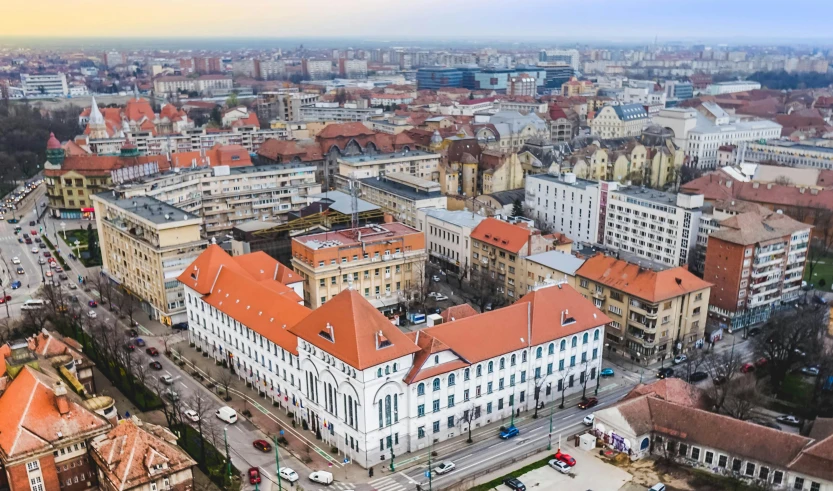 an aerial view of a city with a lot of buildings, by Matija Jama, shutterstock, danube school, square, taras susak, taken in the early 2020s, high quality image”