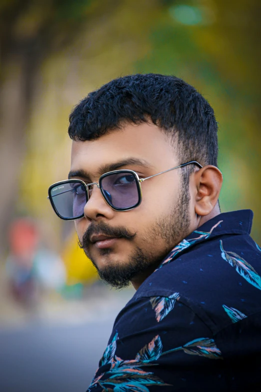 a close up of a person wearing sunglasses, by Max Dauthendey, facebook profile picture, square, bangladesh, casual pose