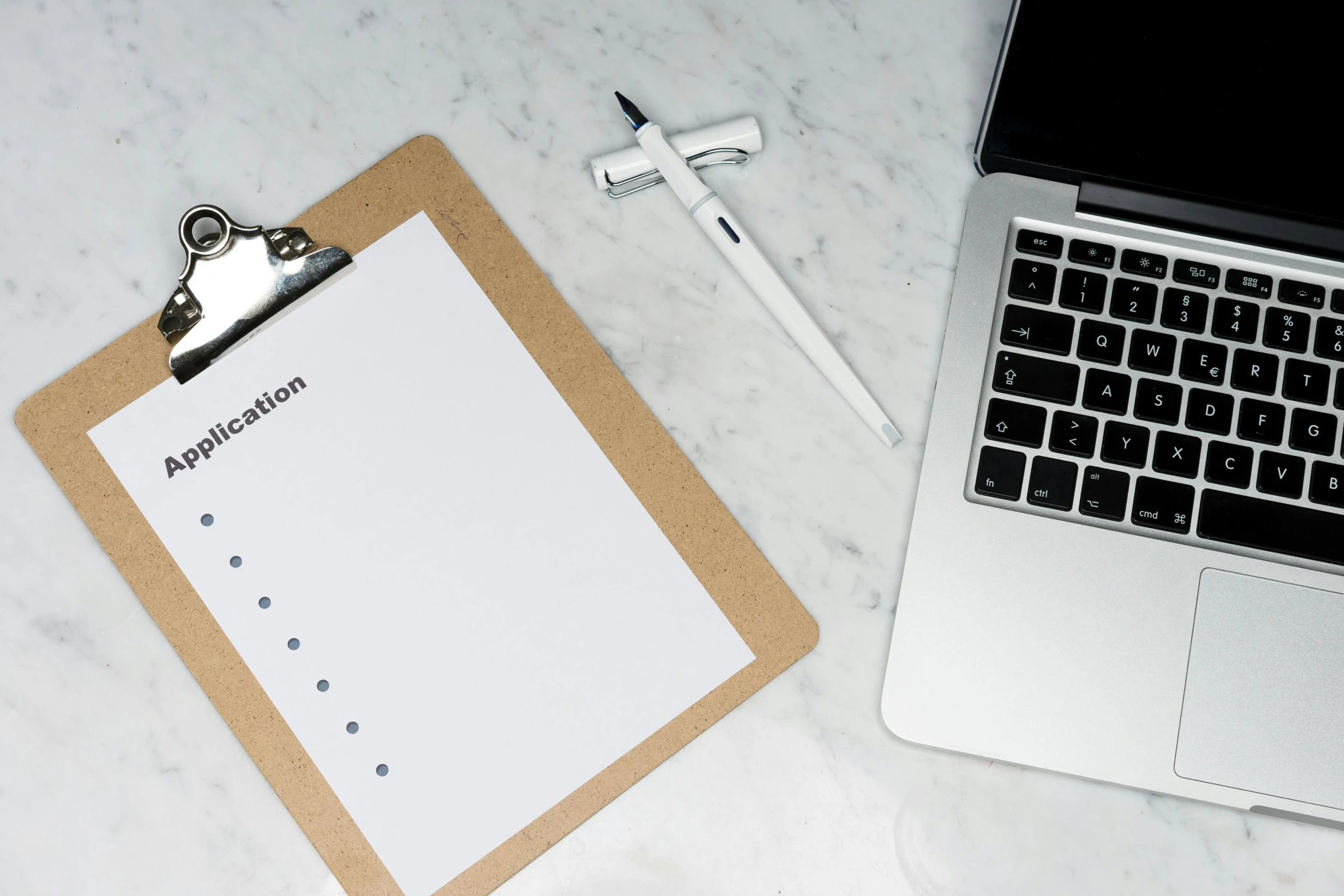 an open laptop computer sitting on top of a desk, pexels contest winner, minimalism, 9 9 designs, clipboard, brown and white color scheme, black ball pen on white paper