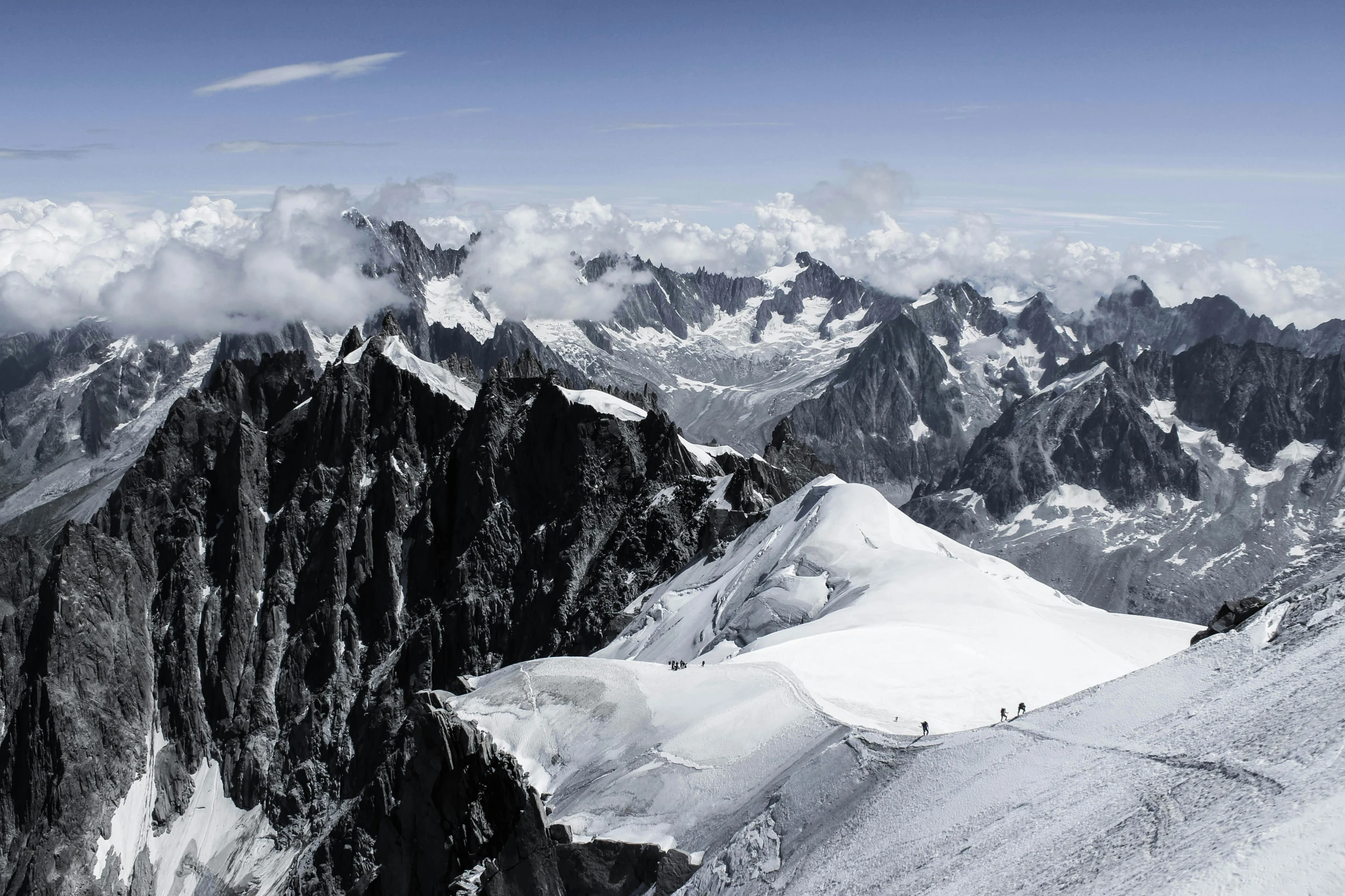 a group of people standing on top of a snow covered mountain, pexels contest winner, les nabis, herzog de meuron, panoramic, high elevation, very high resolution images