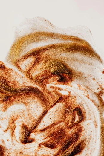 a cup of coffee with a face drawn on it, an ultrafine detailed painting, inspired by Anna Füssli, trending on unsplash, process art, floating spiral sand, detail shot, burst of powders, green and brown color palette