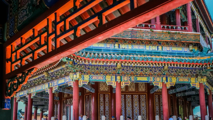 a group of people standing in front of a building, inspired by Wang Yi, pexels contest winner, cloisonnism, there are archways, colorful with red hues, pavilion, colourful close up shot