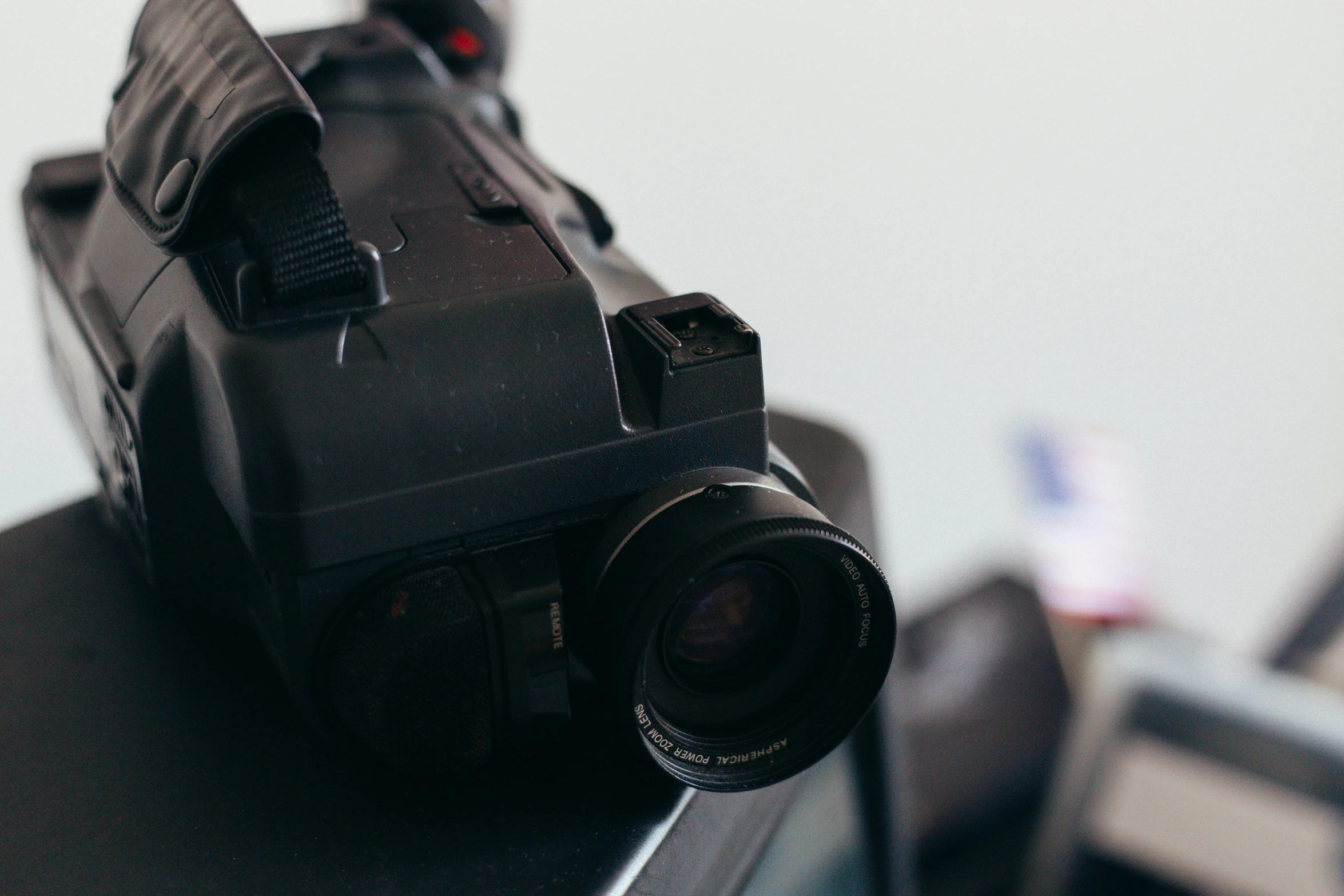 a camera sitting on top of a laptop computer, unsplash, video art, vhs camcorder footage, wartime footage, vhs artefacts, closeup photograph