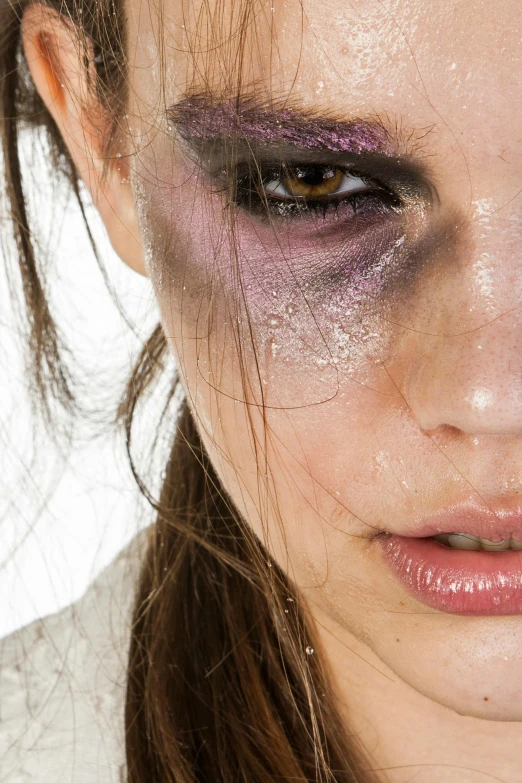 a close up of a person with makeup on, an album cover, inspired by Taro Yamamoto, trending on pexels, renaissance, crying fashion model, urban decay, bruised, close-up fight
