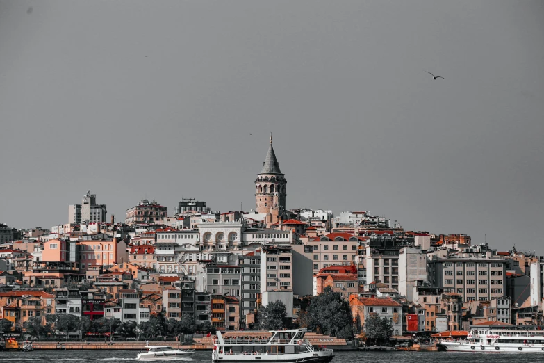 a group of boats floating on top of a body of water, a black and white photo, pexels contest winner, art nouveau, istanbul, city buildings on top of trees, a colorful, grayish